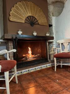 Posezení v ubytování Casas Rurales Maribel - Complejo El Tejar - Apartamentos con jacuzzi en Alcalá del Júcar