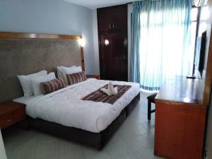 Letto o letti in una camera di Hotel Oscar 1