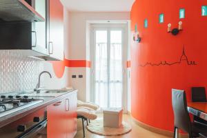 Una cocina o cocineta en Equipped Apt Near to Parco Dora