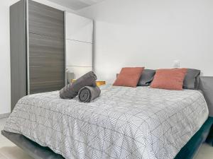 Ένα ή περισσότερα κρεβάτια σε δωμάτιο στο Appartement cosy tout équipé - Séjour idéal à Nice
