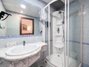 Koupelna v ubytování Hotel Philia