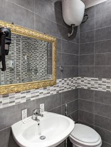 Koupelna v ubytování Hotel Philia