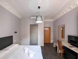 TV a/nebo společenská místnost v ubytování Hotel Philia