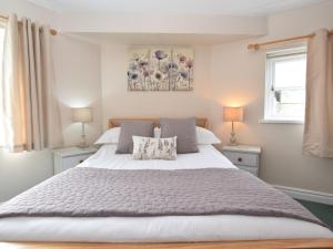 Ένα ή περισσότερα κρεβάτια σε δωμάτιο στο Lake District Family Getaway