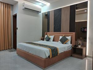 Kaspar Suites客房内的一张或多张床位
