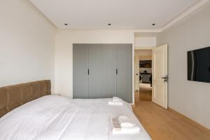 Postel nebo postele na pokoji v ubytování Luxury central apartment not overlooked