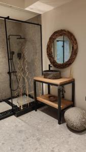 a room with a mirror and a table and a stool at Lana Del Capos in Saints Constantine and Helena +34 photos