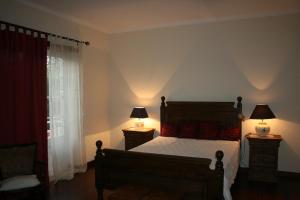 Ένα ή περισσότερα κρεβάτια σε δωμάτιο στο Casa do Campo - Castelo Branco