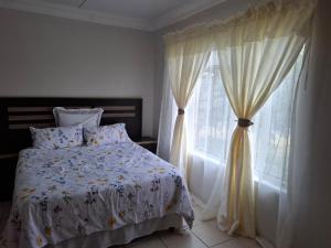 Postel nebo postele na pokoji v ubytování Two Bedroom Ensuite in Polokwane