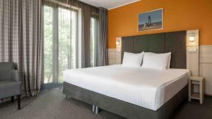 Postel nebo postele na pokoji v ubytování Wellton Riga Hotel & SPA