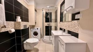 Koupelna v ubytování Apartamenty Izerskie + 37 fotografií