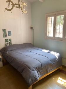 Ένα ή περισσότερα κρεβάτια σε δωμάτιο στο Emilia Posada de Montaña