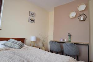 Ένα ή περισσότερα κρεβάτια σε δωμάτιο στο Willa Magnolia