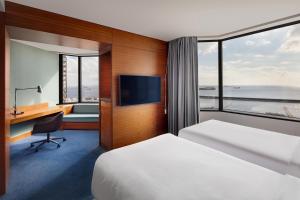 A bed or beds in a room at Sheraton Istanbul Atakoy Hotel