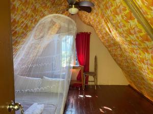 Postel nebo postele na pokoji v ubytování Forest Camp El Nido
