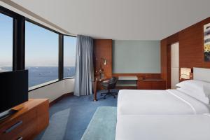 A bed or beds in a room at Sheraton Istanbul Atakoy Hotel
