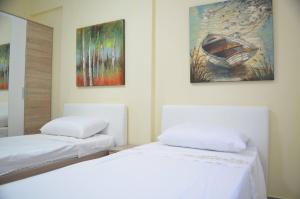 Katil atau katil-katil dalam bilik di Home Sweet Home by the Sea - 060