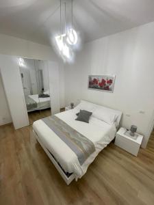 Postel nebo postele na pokoji v ubytování Alloggio turistico Casa di Lu