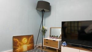 TV a/nebo společenská místnost v ubytování Sky Garden