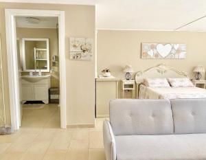 A bed or beds in a room at Dependance Villa delle Ulie