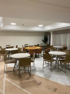 En restaurant eller et andet spisested på Guarajuba - Paraiso dos Coqueiros BA