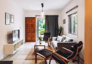 Posezení v ubytování H&O Royal Townhouse in Center Paphos