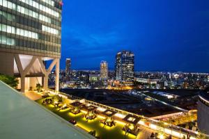 a view of a city skyline at night at The Westin Osaka in Osaka
