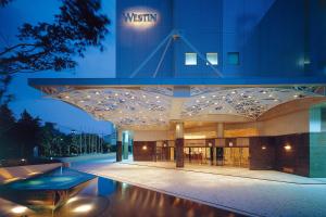 a view of a building with a lit up ceiling at The Westin Osaka in Osaka