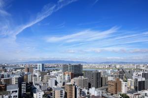 a view of a city with tall buildings at The Westin Osaka in Osaka