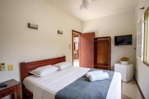 Postel nebo postele na pokoji v ubytování Casa Poema Paraty