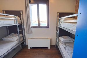 A bed or beds in a room at Generator Venice