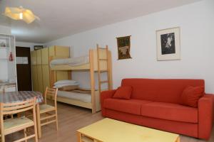 En eller flere senge i et værelse på Gran Baita