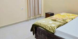 Postel nebo postele na pokoji v ubytování Hotel Siddhi Palace, Ayodhya Near Ram Mandir