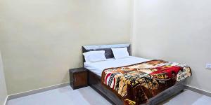 Postel nebo postele na pokoji v ubytování Hotel Siddhi Palace, Ayodhya Near Ram Mandir