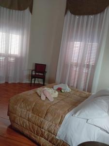 Postel nebo postele na pokoji v ubytování Hotel Sant'Elia