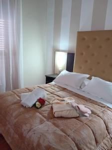 Postel nebo postele na pokoji v ubytování Hotel Sant'Elia