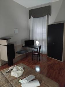 TV a/nebo společenská místnost v ubytování Hotel Sant'Elia