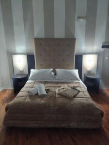 Postel nebo postele na pokoji v ubytování Hotel Sant'Elia