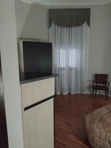 TV a/nebo společenská místnost v ubytování Hotel Sant'Elia