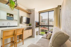 Køkken eller tekøkken på UML - Apartamentos quadra mar em Bombinhas