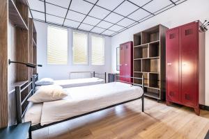 Postel nebo postele na pokoji v ubytování Vola Hostel