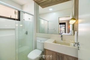 Et badeværelse på UML - Apartamentos quadra mar em Bombinhas + 54 billeder