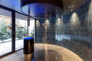 Vannituba majutusasutuses Almwellness Hotel Pierer