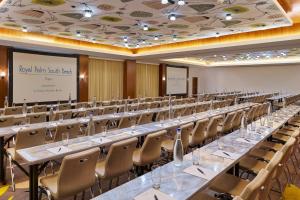 a large room with long tables and chairs at Royal Palm South Beach Miami, a Tribute Portfolio Resort in Miami Beach +54 photos