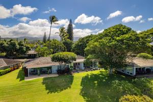 an aerial view of a house with a yard at Exclusive Oceanfront Access at Alaeloa #3 in Kahana