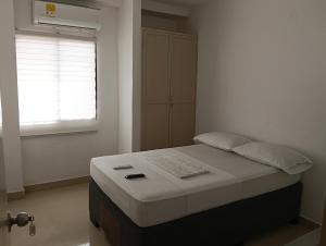 Postel nebo postele na pokoji v ubytování Apartamento mariana