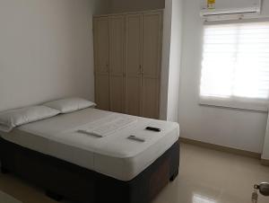 Postel nebo postele na pokoji v ubytování Apartamento mariana