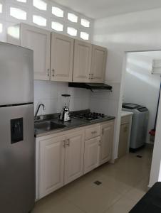 Kuchyň nebo kuchyňský kout v ubytování Apartamento mariana