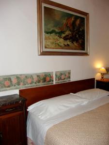 Postel nebo postele na pokoji v ubytování Albergo San Giovanni