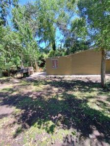 a house with a fence in a yard at Casa para 3 personas con patio in Barrio Félix U Camet